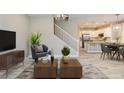 Open concept living room showcases hardwood floors, stairs, and eat-in kitchen at 11396 Ogden Mills Dr # 101, Las Vegas, NV 89135