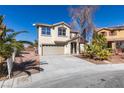 Well-maintained two-story home with mature landscaping, driveway, and welcoming entrance at 4141 Coburn St, North Las Vegas, NV 89032