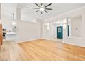 Spacious living room featuring hardwood floors, ample natural light, and a minimalist design at 5009 Elm Grove Dr, Las Vegas, NV 89130