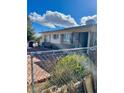 Cozy single-story home with secure iron door and a well-lit exterior at 5201 Glen Eagles Ln, Las Vegas, NV 89108