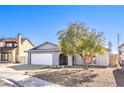 Charming single-story home with a two-car garage and mature landscaping in a well-maintained neighborhood at 6741 Bonillo Dr, Las Vegas, NV 89103