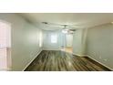 The inviting living room features durable flooring and plenty of natural light at 7985 Flower Seeds St, Las Vegas, NV 89139