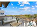 Relaxing balcony with comfortable seating offering stunning neighborhood views on a bright sunny day at 1091 E Sunset Rd, Henderson, NV 89011