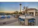 Rooftop pool area featuring the iconic Stratosphere in the background at 200 W Sahara Ave # 1711, Las Vegas, NV 89102