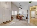 Formal dining area featuring natural light and a ceiling fan at 420 Blush Creek Pl, Las Vegas, NV 89144