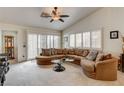 Spacious living room features a large sectional couch and plenty of natural light at 420 Blush Creek Pl, Las Vegas, NV 89144