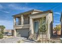 Charming two-story home with a welcoming front porch and well-maintained landscaping at 5606 Spring Trellis St, Las Vegas, NV 89113