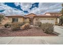 Lovely single-story home with a tidy front yard, complemented by a convenient two-car garage at 9071 Ravenhurst St, Las Vegas, NV 89123