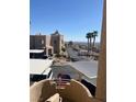 View from balcony overlooking parking area and desert landscape at 2240 Highpointe Dr # 201, Laughlin, NV 89029