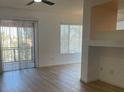 Open living area with lots of natural light and sliding door leading to a balcony at 27 E Agate Ave # 303, Las Vegas, NV 89123