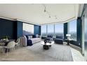 Spacious living room featuring floor-to-ceiling windows with city views and sophisticated decor at 322 Karen Ave # 2501, Las Vegas, NV 89109