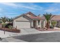 Charming single-story home featuring a two-car garage, desert landscaping, and a welcoming front porch at 3640 Chateau Meadow St, Las Vegas, NV 89129