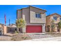 Contemporary two-story home with a red garage door, desert landscaping, and blue sky at 804 Ruby Sedona Ave # Lot 152, North Las Vegas, NV 89081