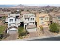 An aerial view showcases the neighborhood's layout and proximity to mountain ranges at 120 Campbelltown Ave, Henderson, NV 89015