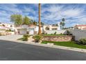 Lovely single-story home boasting a two-car garage, attractive landscaping, and inviting curb appeal at 230 Pintale Cir, Henderson, NV 89074