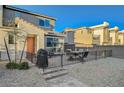 Inviting backyard with patio, seating, and a grill perfect for outdoor enjoyment at 2657 Fawn Beige Ct, North Las Vegas, NV 89086