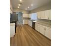 Well-lit kitchen with stainless steel appliances, ample counter space, and a clean, modern design at 3304 Michelangelo Ct, Las Vegas, NV 89129