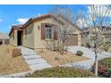 Inviting home featuring desert landscaping and a covered front entry at 4340 Hatch Bend Ave, North Las Vegas, NV 89031