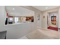 Spacious living room featuring neutral walls, and seamless access to the kitchen at 4340 Hatch Bend Ave, North Las Vegas, NV 89031