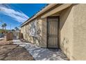 Inviting front entrance with security door and a walkway leading to the main entrance at 6035 Eganridge Ct, North Las Vegas, NV 89081