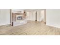 Spacious living room with a fireplace, and staircase at 2647 Jacyra Ave, Las Vegas, NV 89121