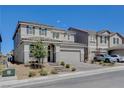 Attractive two-story home with a two-car garage and beautiful landscaping at 3524 Crotone Ave, Henderson, NV 89044