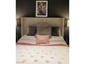 Cozy bedroom with plush bedding, decorative pillows, and soft ambient lighting at 353 E Bonneville Ave # 447, Las Vegas, NV 89101