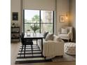 Bright living room featuring modern furnishings, neutral tones, and an outdoor view at 353 E Bonneville Ave # 447, Las Vegas, NV 89101