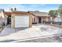 Cozy single-story home with attached garage and ample parking space at 5005 Harmony Ave, Las Vegas, NV 89107