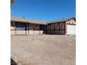 One story home featuring desert landscaping, a garage and a stucco exterior at 6760 Fallona Ave, Las Vegas, NV 89156