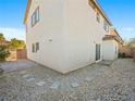 Backyard featuring decorative stone ground cover with a stone patio area at 8620 Abbey Dell Ave, Las Vegas, NV 89178