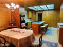 A warm wooden kitchen with skylights, granite countertops and an island at , Mount Charleston, NV 89124