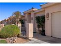 Attractive home exterior with a manicured lawn and desert landscaping enhancing the curb appeal at 328 Vineyard Ln, Mesquite, NV 89027