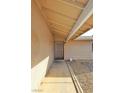 This angle of the walkway shows the entry and covered landing of this single-story home at 3630 Willow Springs Dr, Las Vegas, NV 89103