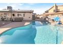 Sparkling in-ground swimming pool with a jacuzzi and plenty of patio space for outdoor enjoyment at 5200 Valley Glen St, Las Vegas, NV 89119