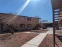 Exterior shot of apartment building with landscaping, stairs, and walkways at 615 S Royal Crest Cir # 15, Las Vegas, NV 89169