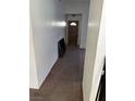 Hallway featuring a wooden front door at 7643 Kalmalii Ave, Las Vegas, NV 89147