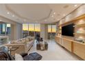 Contemporary living room with an entertainment center, city views and comfortable seating at 2747 Paradise Rd # Ph 3604, Las Vegas, NV 89109