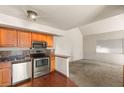 Charming kitchen with stainless steel appliances and ample counter space at 5166 Gray Ln # M, Las Vegas, NV 89119