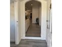 Inviting entryway with an arched doorway leading into a bright, open living space at 621 S 9Th St, Las Vegas, NV 89101