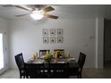 Well-lit dining area with a modern table and seating for six at , Las Vegas, NV 89118