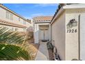 Inviting front entrance featuring double doors and a well-maintained walkway at 1924 Falling Tree Ave, North Las Vegas, NV 89031