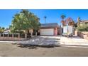 Charming single-story home with a two-car garage and beautiful mature trees at 4095 Ridgewood Ave, Las Vegas, NV 89120