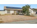 Inviting single-story home with low-maintenance desert landscaping and efficient solar panels at 53 Montello Ave, Las Vegas, NV 89110