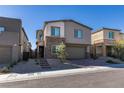 Charming two-story home with a brick driveway and desert landscaping at 9239 Albus Hills Ave, Las Vegas, NV 89143