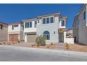 Charming two-story home with landscaped yard and two car garage at 1320 Crimson Sunbird Ave, North Las Vegas, NV 89084