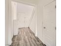 Inviting home entryway featuring beautiful hardwood flooring and crisp white walls at 3004 Moulin Heights St, Las Vegas, NV 89156