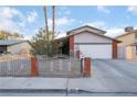 Inviting home with a spacious driveway, mature landscaping, and a classic design at 608 Cragin Park Dr, Las Vegas, NV 89107