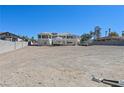 Large backyard with the home's exterior in the background, plus room for parking at 736 N Kiel St, Henderson, NV 89015
