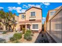 Inviting two-story home with desert landscaping, a covered porch, and well-placed accents at 11094 Arcadia Sunrise Dr, Henderson, NV 89052